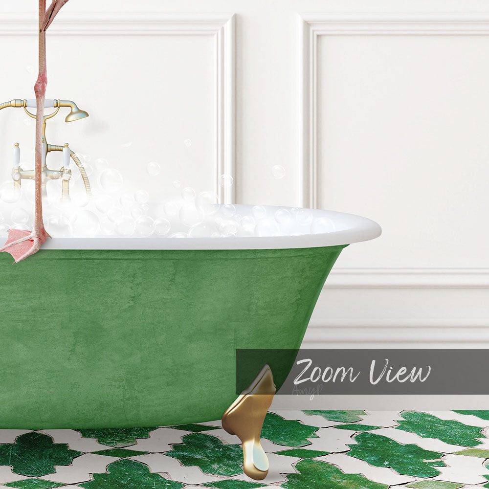 A green clawfoot bathtub filled with water, with a gold faucet and a pink towel hanging on the side.