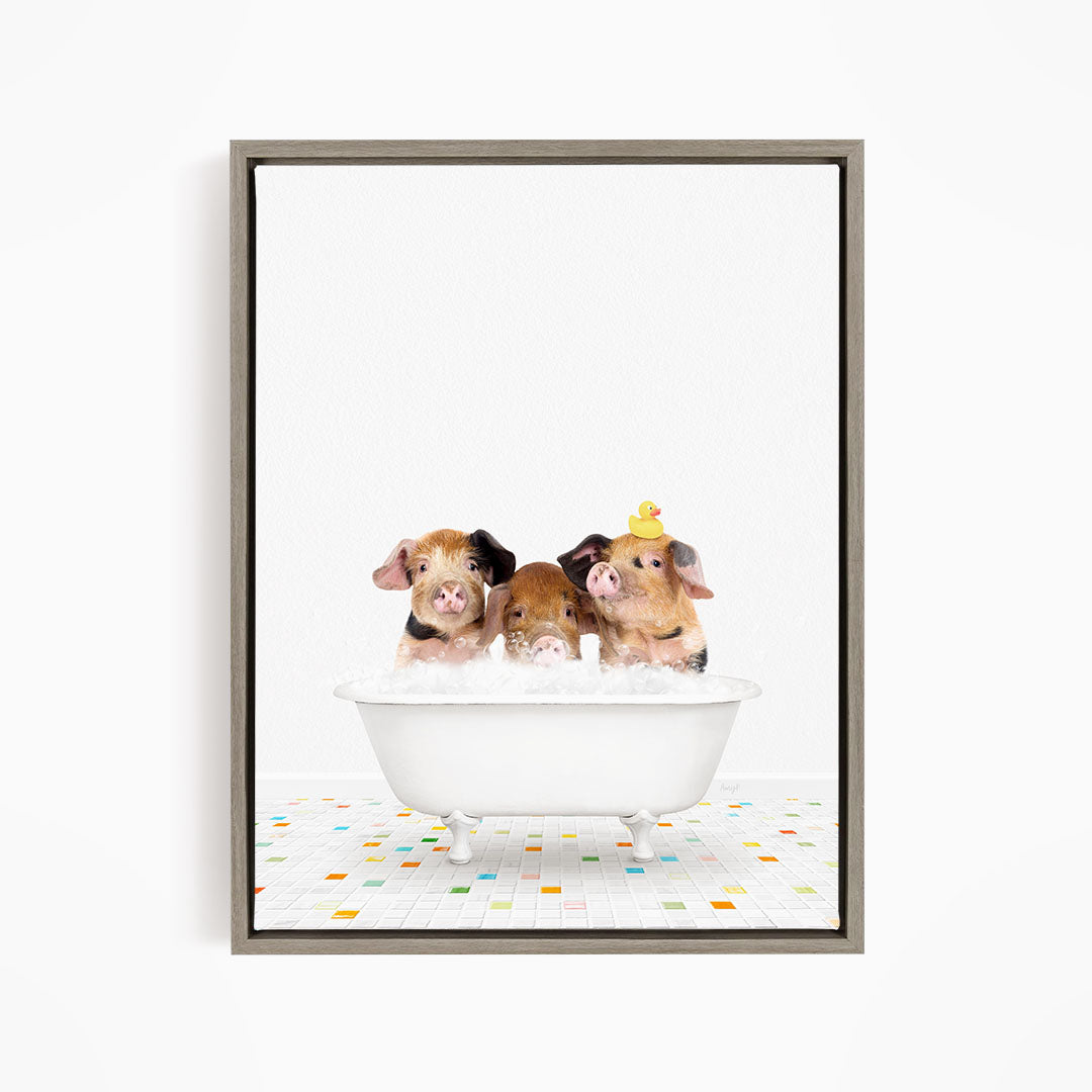 Three adorable pigs sitting in a white bathtub, with one of them wearing a yellow rubber duck hat.