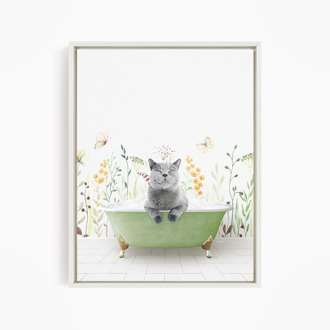 A gray cat sitting in a green bathtub, surrounded by flowers and butterflies.