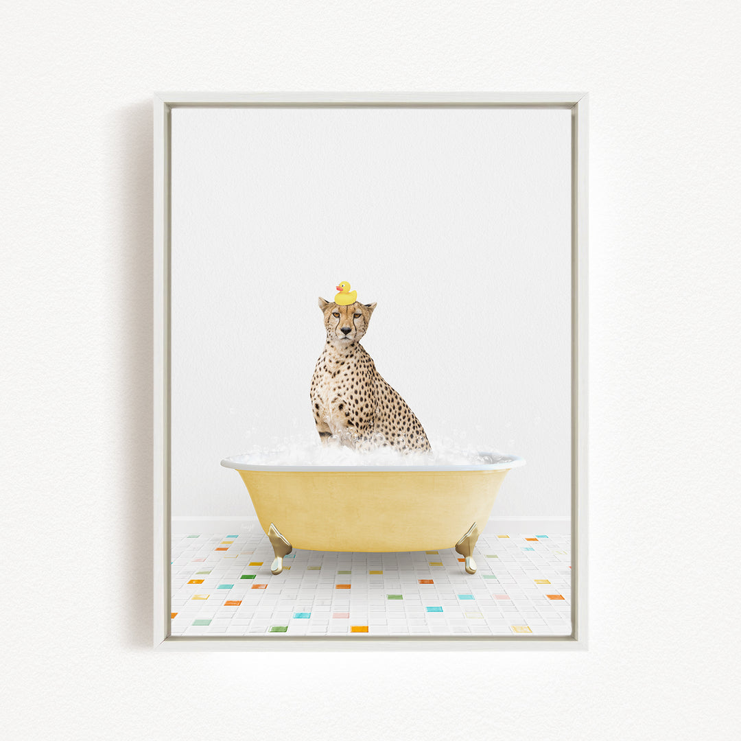 A cheetah wearing a yellow hat sits in a yellow bathtub filled with bubbles, surrounded by a colorful tiled floor.