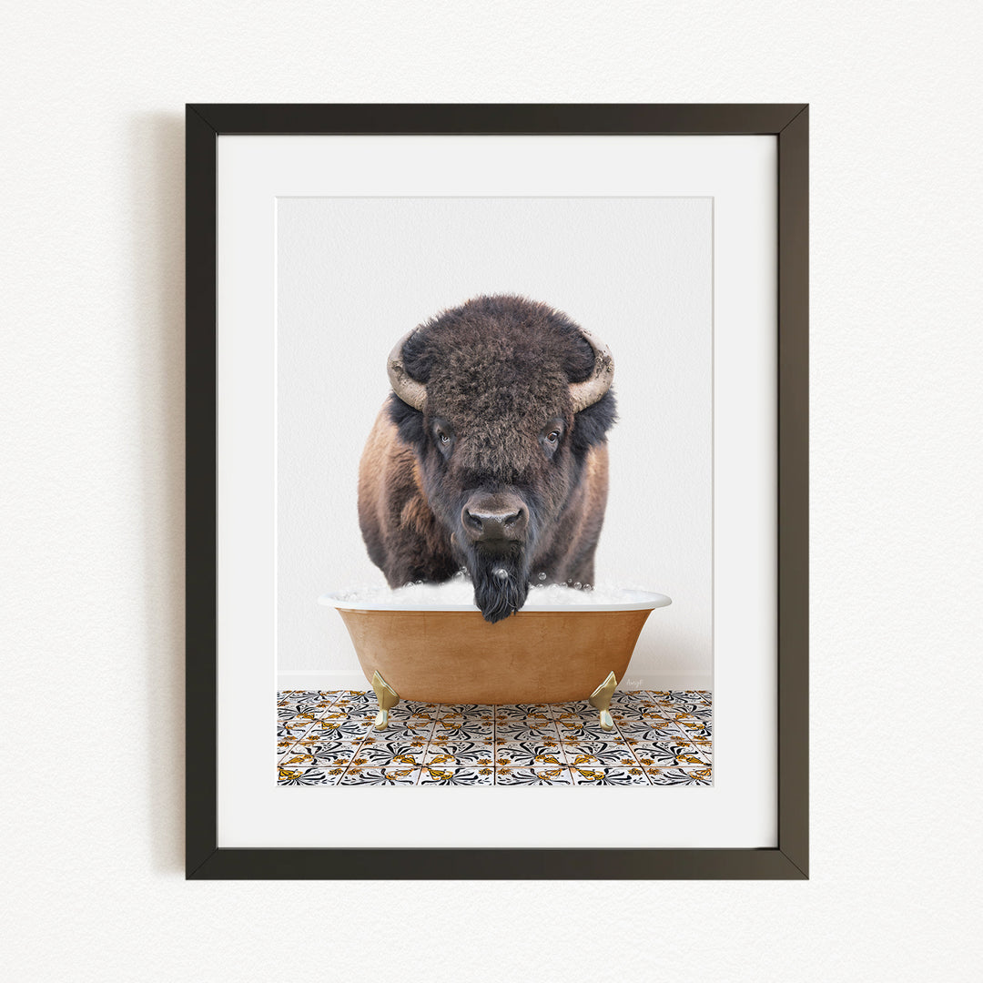 A buffalo with large horns is standing in a bathtub filled with water, creating a playful and whimsical scene.