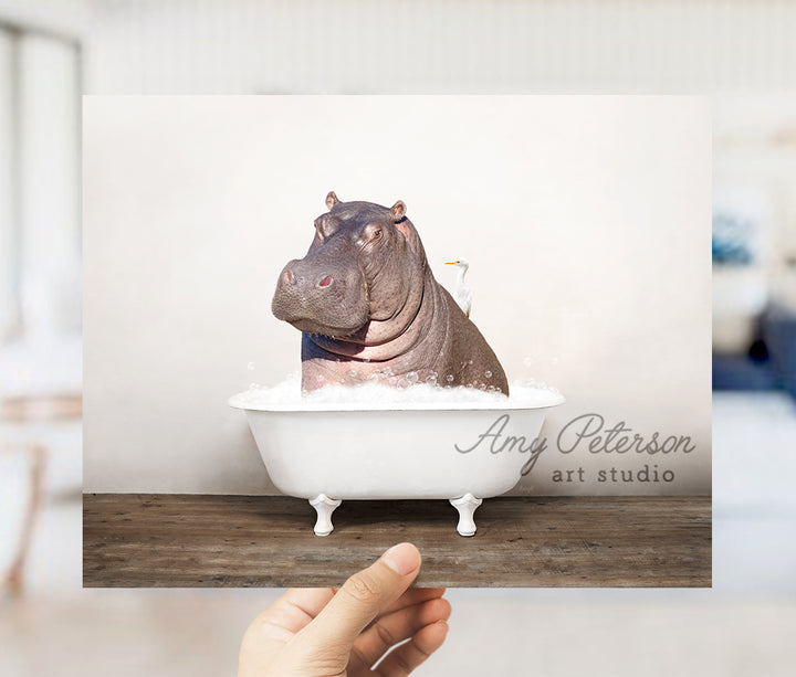 a hippopotamus in a bathtub with the caption art studio