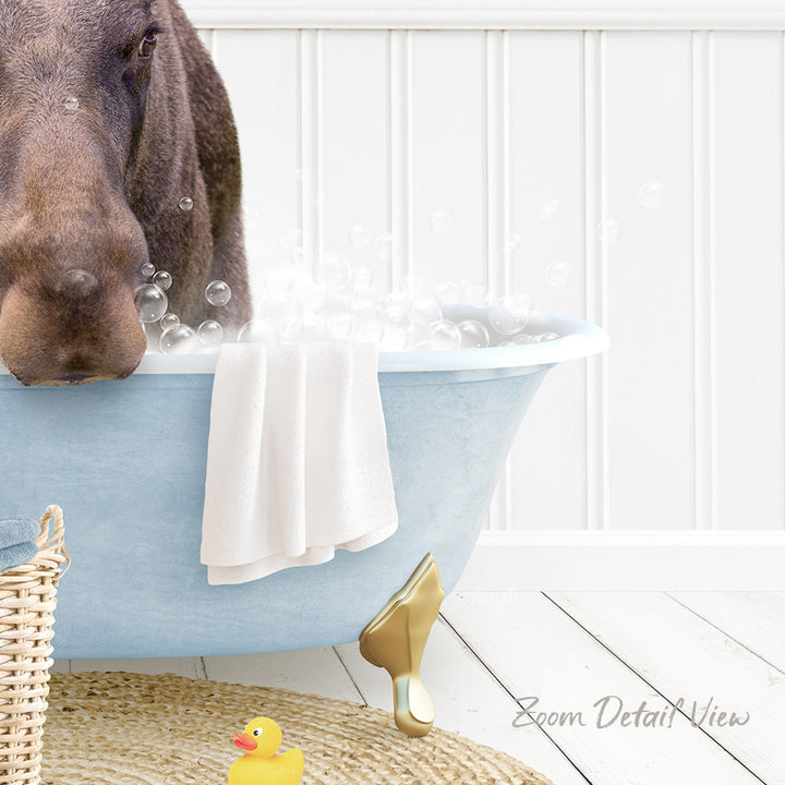 A dog is sitting in a blue bathtub filled with bubbles, surrounded by a yellow rubber duck and a white towel.