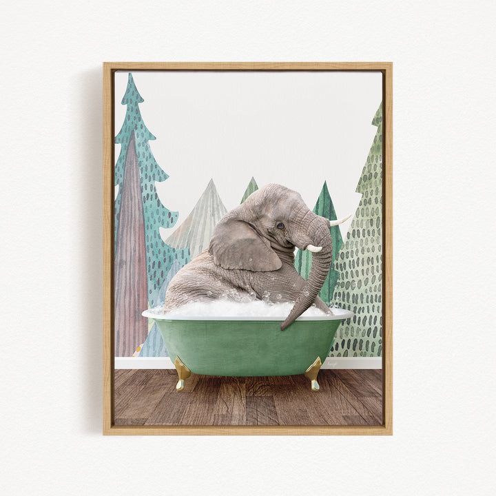 A gray elephant is sitting in a green bathtub, surrounded by a forest-like background with trees and a snowy landscape.