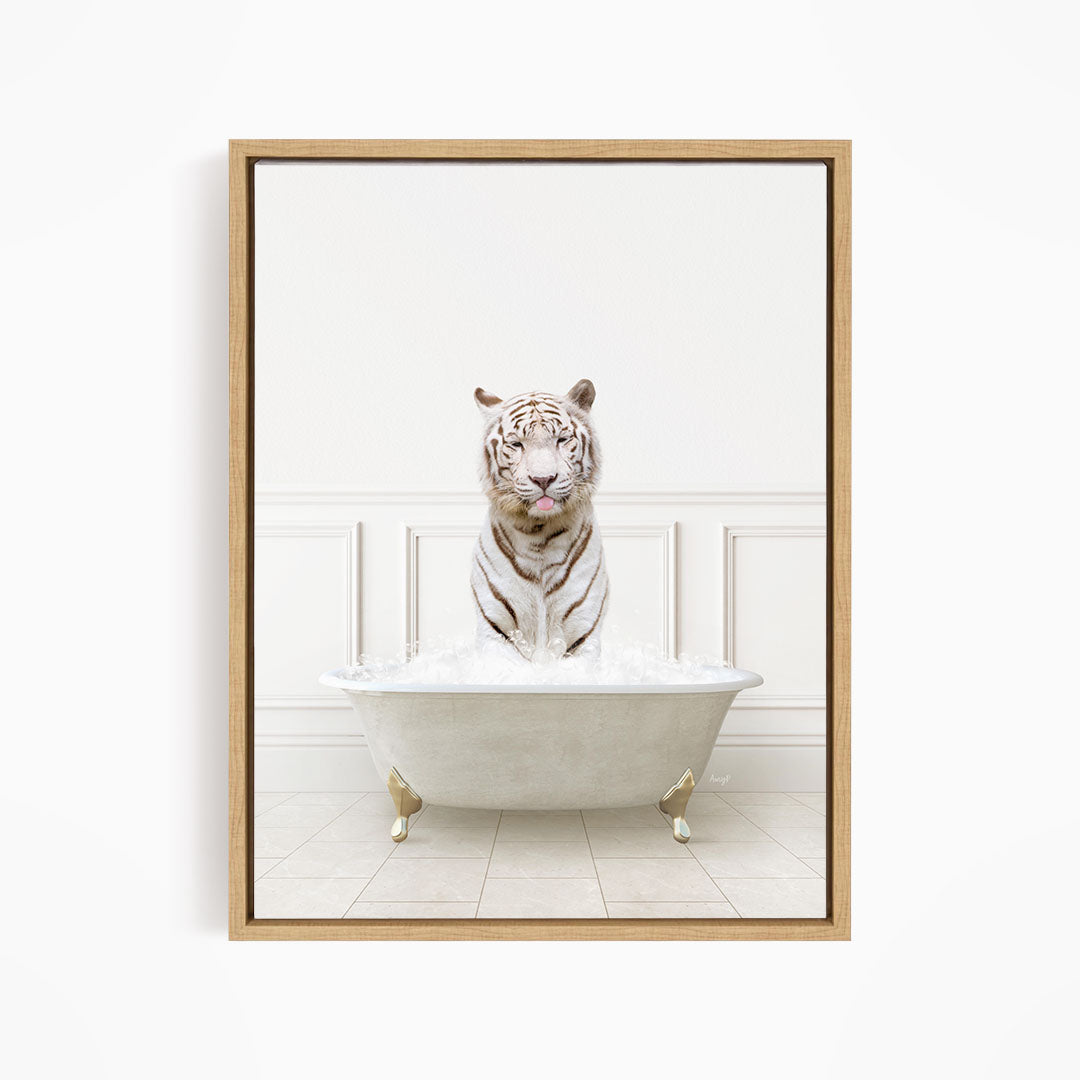 A white tiger is sitting in a white bathtub filled with water, with its mouth open and appearing to be enjoying the bath.