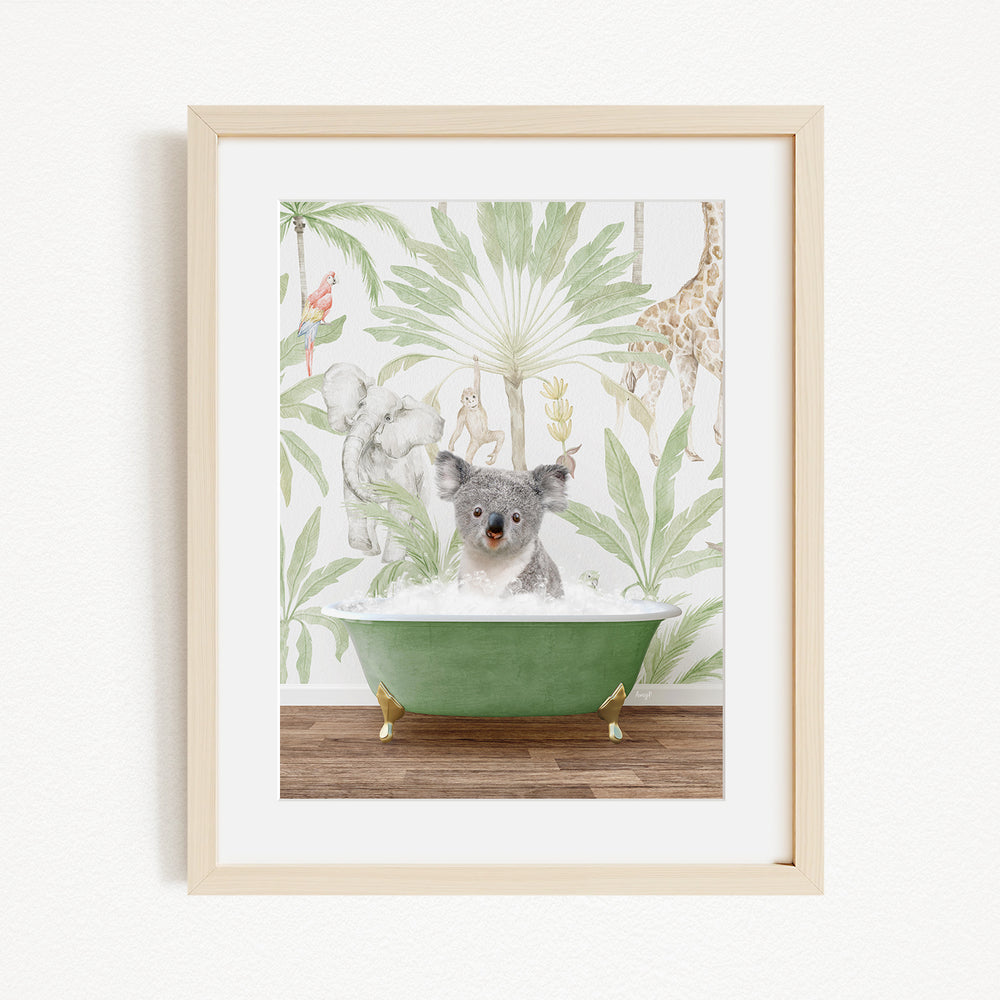 A koala is sitting in a green bathtub, surrounded by a tropical wallpaper with various animals, including a giraffe and a monkey.