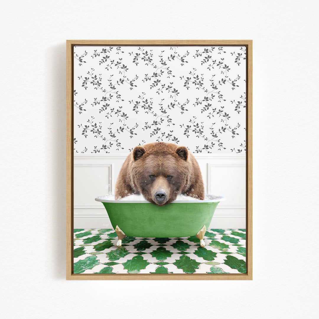 A brown bear is sitting in a green bathtub, surrounded by a patterned wall and green and white tiles on the floor.