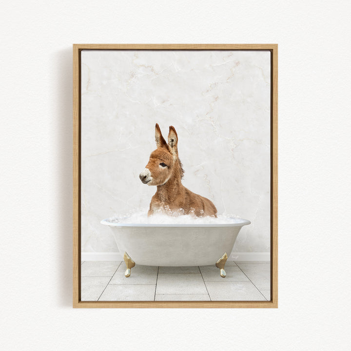 A donkey is sitting in a white bathtub filled with water, creating a playful and whimsical scene.