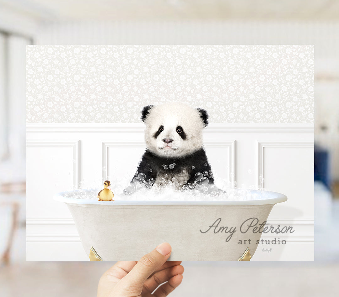 a panda bear sitting in a bathtub with a rubber duck in it