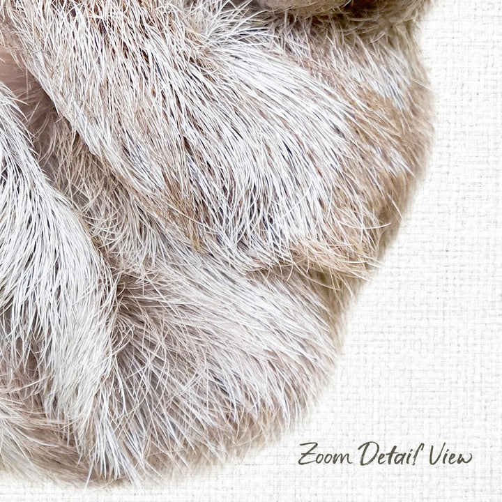 a close-up view of a fluffy, furry object, possibly a piece of fabric or a stuffed animal, with a text overlay that reads "Zoom Detail View".