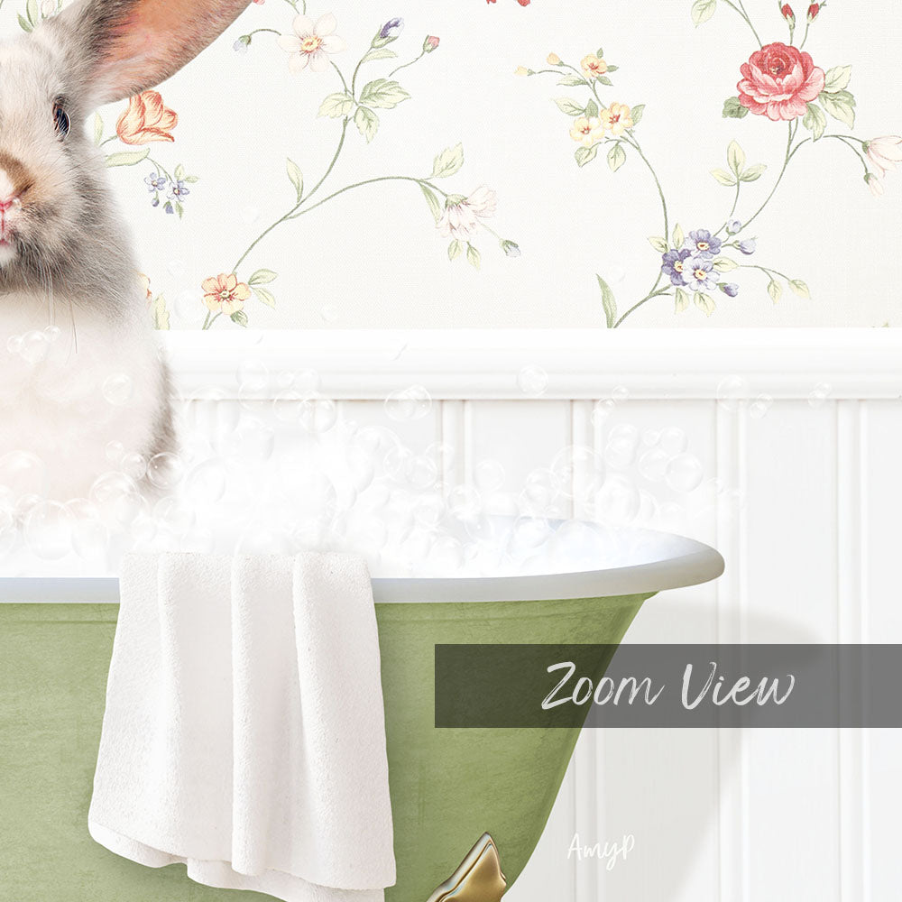 A white rabbit sitting in a green bathtub filled with bubbles, with a floral wallpaper in the background.