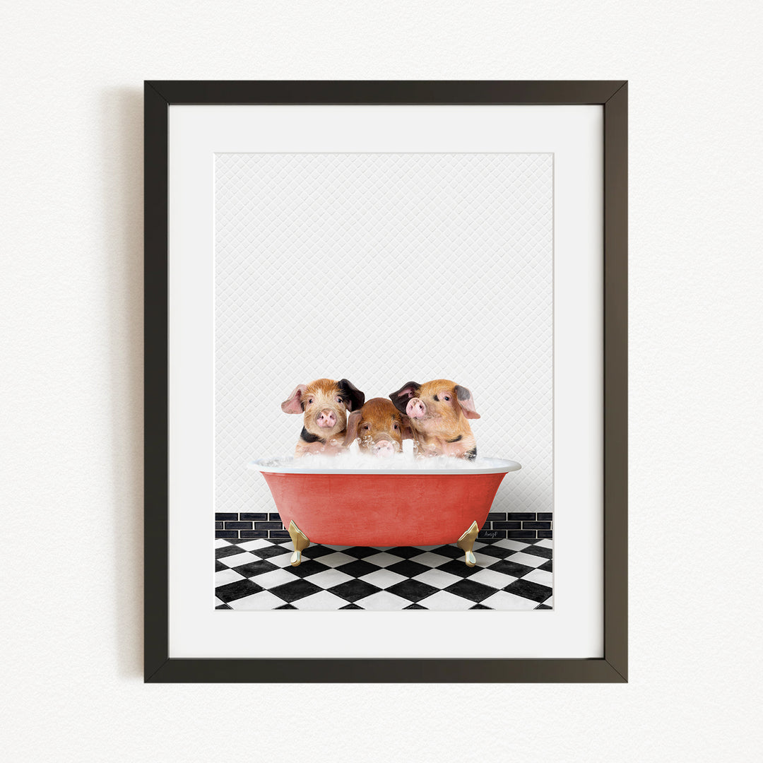 Three adorable hamsters sitting in a red bathtub on a black and white checkered floor.