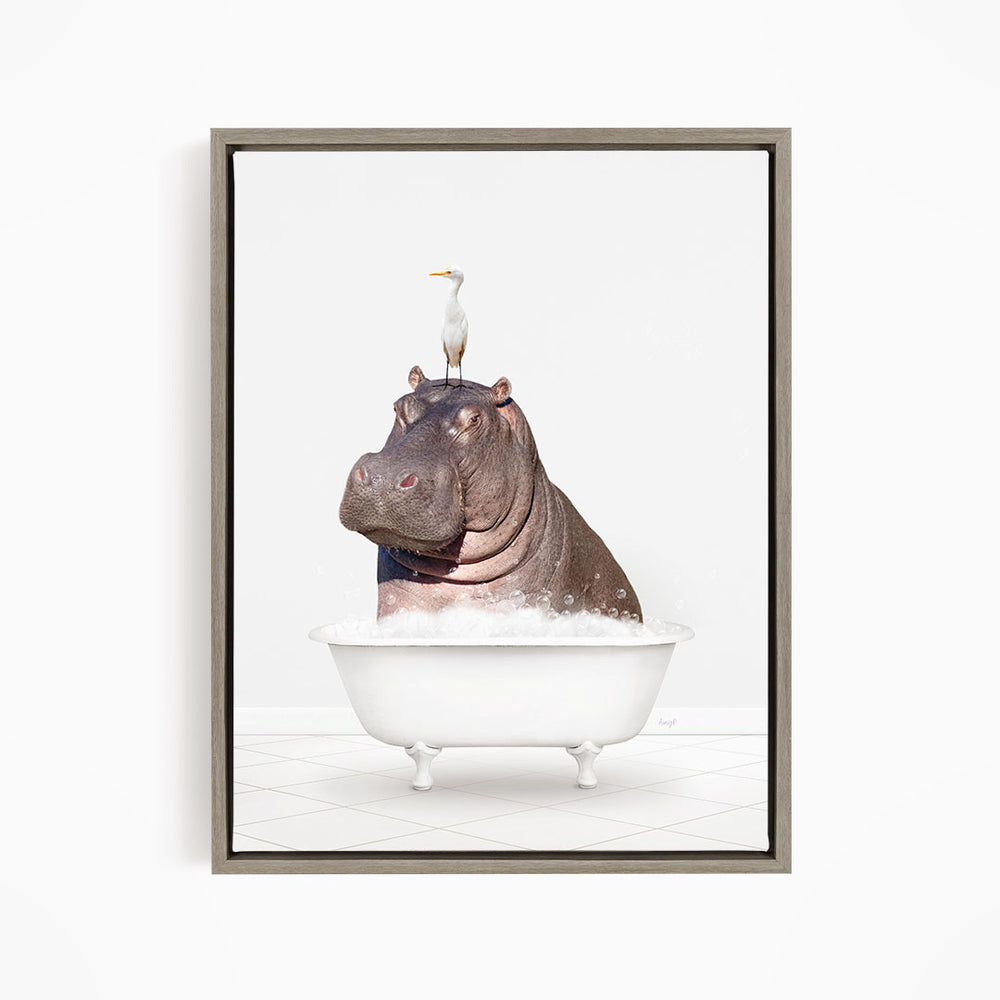A large hippopotamus is sitting in a white bathtub, with a seagull perched on its head.