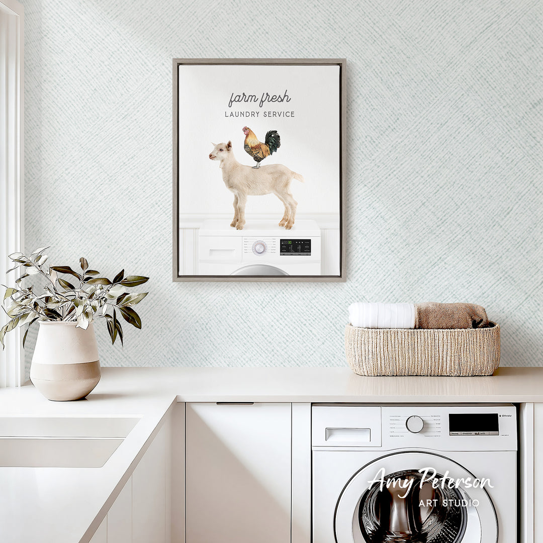 a farm fresh farm fresh laundry service advertisement, with a framed poster hanging on a wall above a white washing machine and a basket of towels.