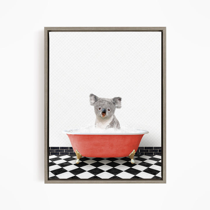 A koala bear sitting in a red bathtub filled with water, surrounded by a black and white checkered floor.