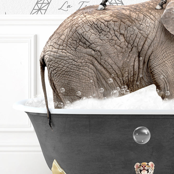 an elephant is taking a bath in a bathtub