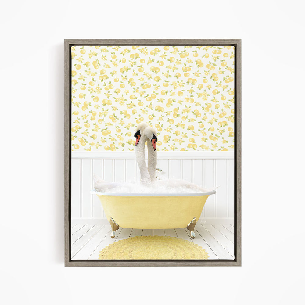 A white swan is sitting in a yellow bathtub filled with bubbles, with a yellow floral wallpaper behind it.