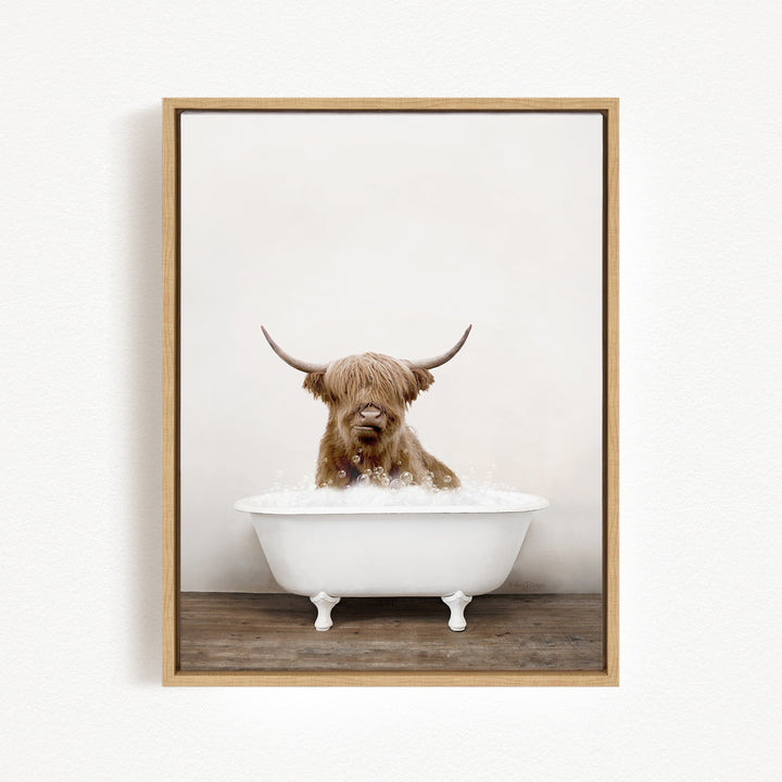 A Highland cow with long horns is sitting in a white bathtub filled with water, creating a whimsical and playful scene.