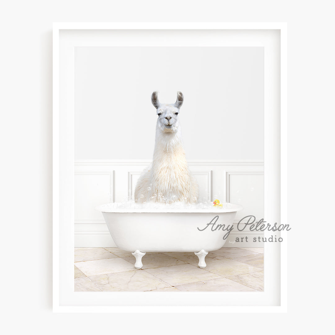 a llama sitting in a bathtub in a bathroom