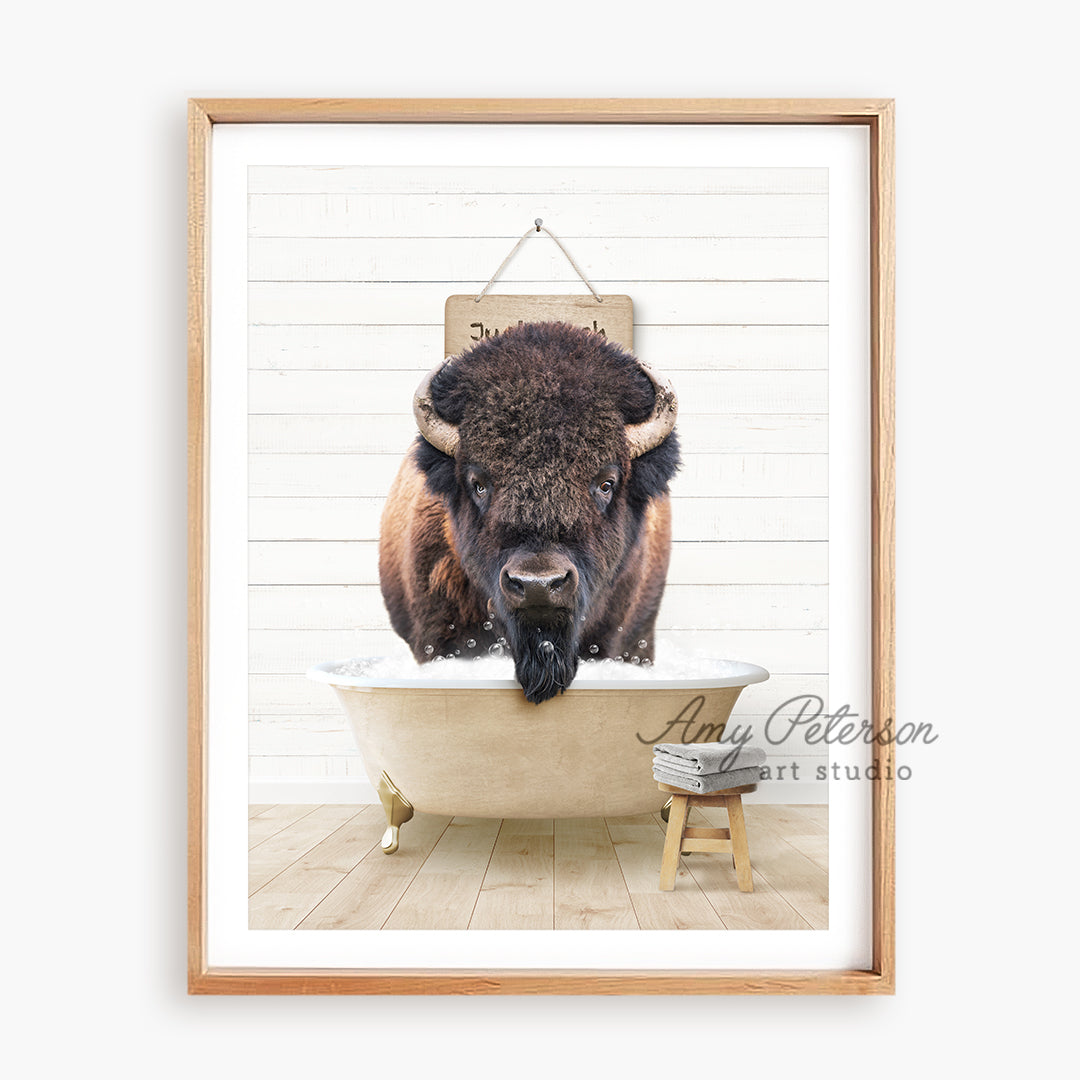 a picture of a bison taking a bath in a tub