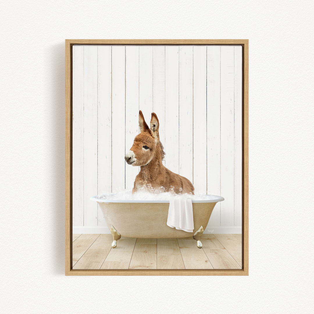 A donkey is sitting in a bathtub filled with water, creating a playful and whimsical scene.