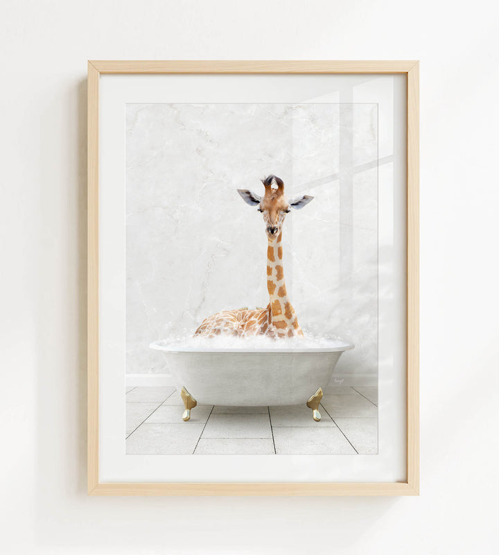 A giraffe is sitting in a white bathtub filled with bubbles, creating a whimsical and playful scene.