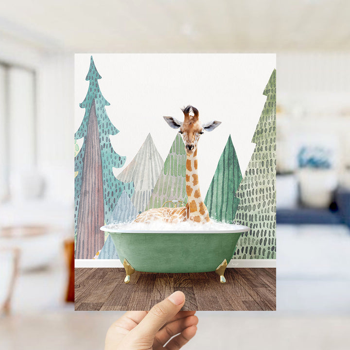 A giraffe sitting in a green bathtub, surrounded by trees and a snowy landscape.