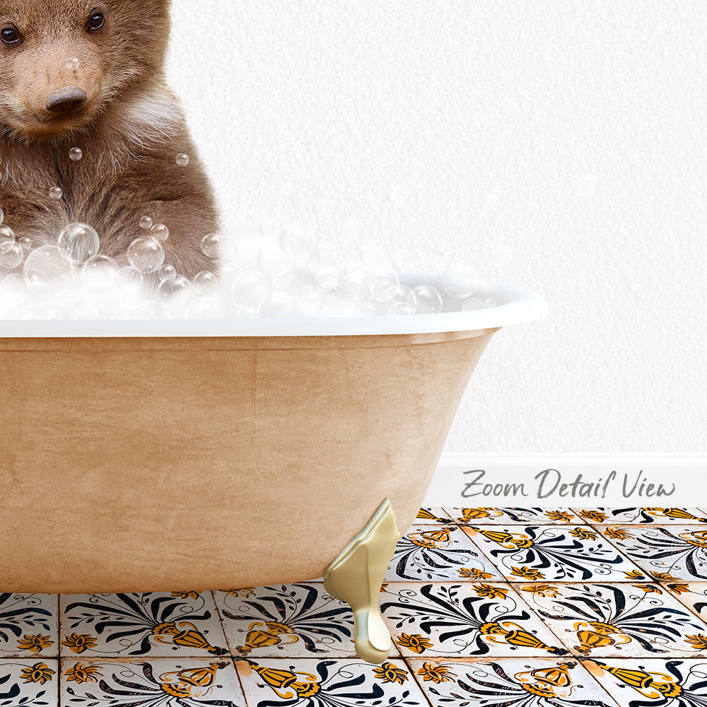 A brown bear is sitting in a bathtub filled with bubbles, surrounded by a patterned tile floor.