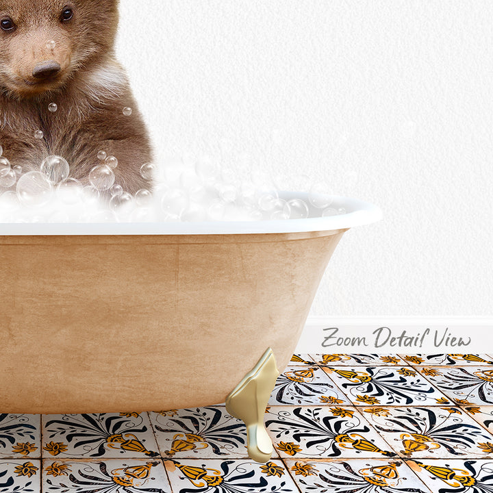 A brown bear is sitting in a bathtub filled with bubbles, surrounded by a patterned tile floor.