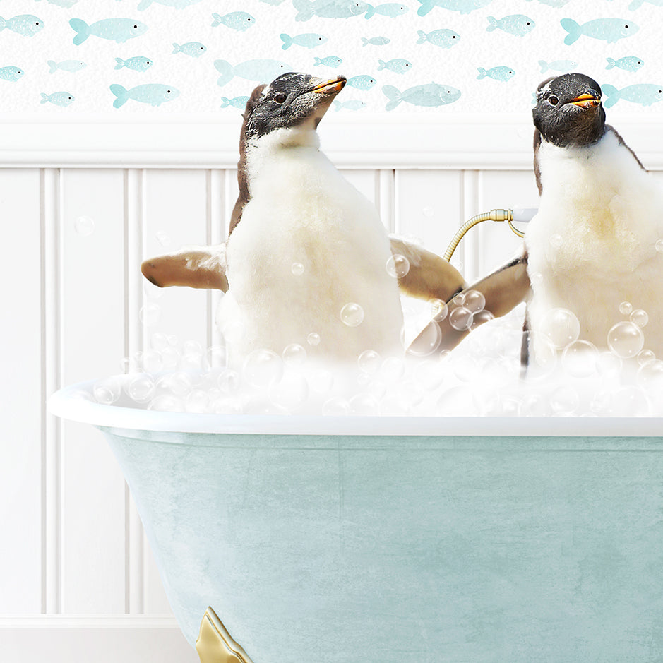 two penguins sitting in a bathtub with bubbles