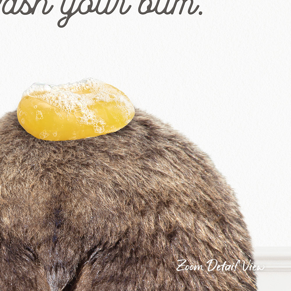 A close-up of a furry animal, possibly a bear or a rabbit, with a yellow object, possibly a soap bubble or a piece of food, resting on its head.