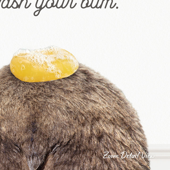 A close-up of a furry animal, possibly a bear or a rabbit, with a yellow object, possibly a soap bubble or a piece of food, resting on its head.