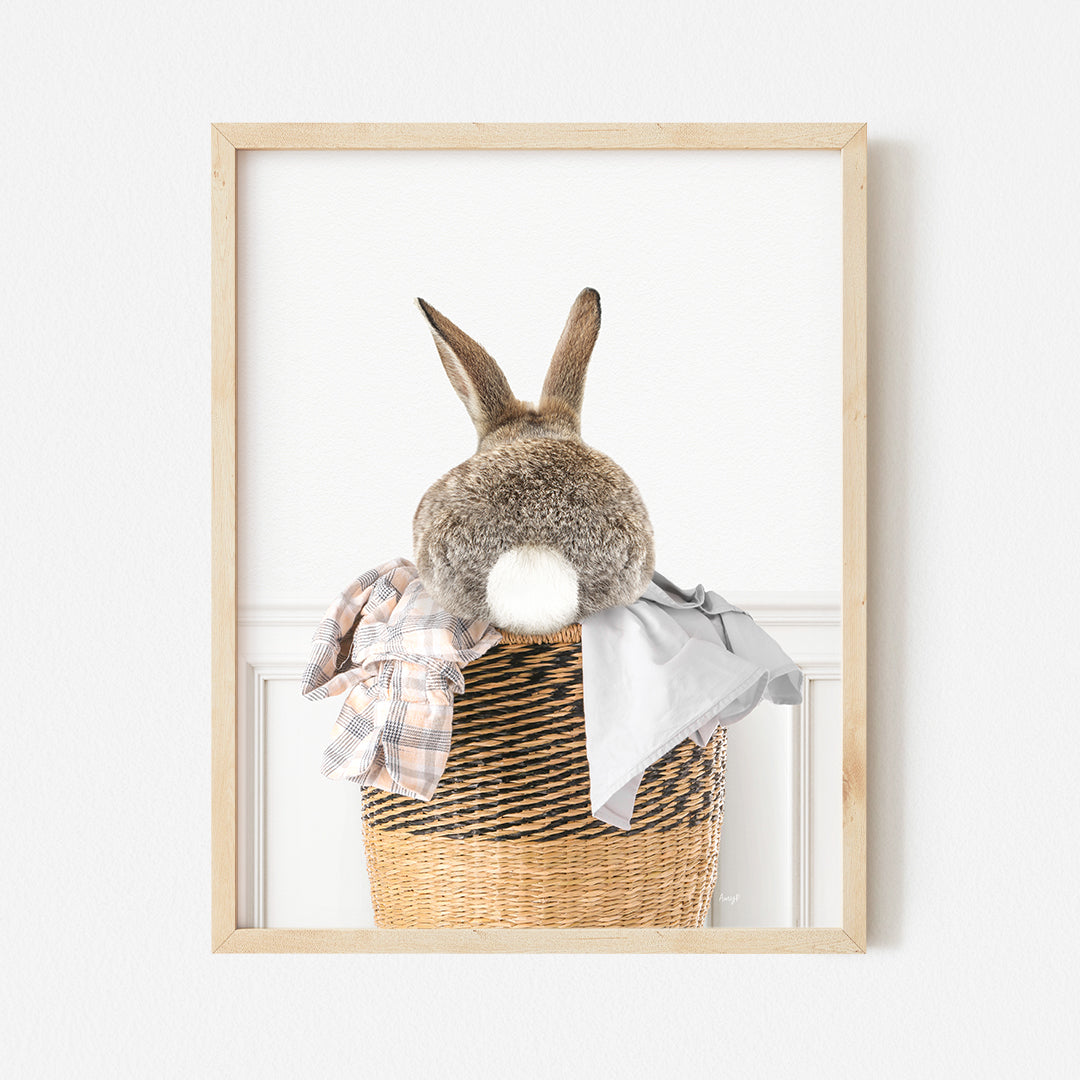 a picture of a stuffed rabbit in a basket