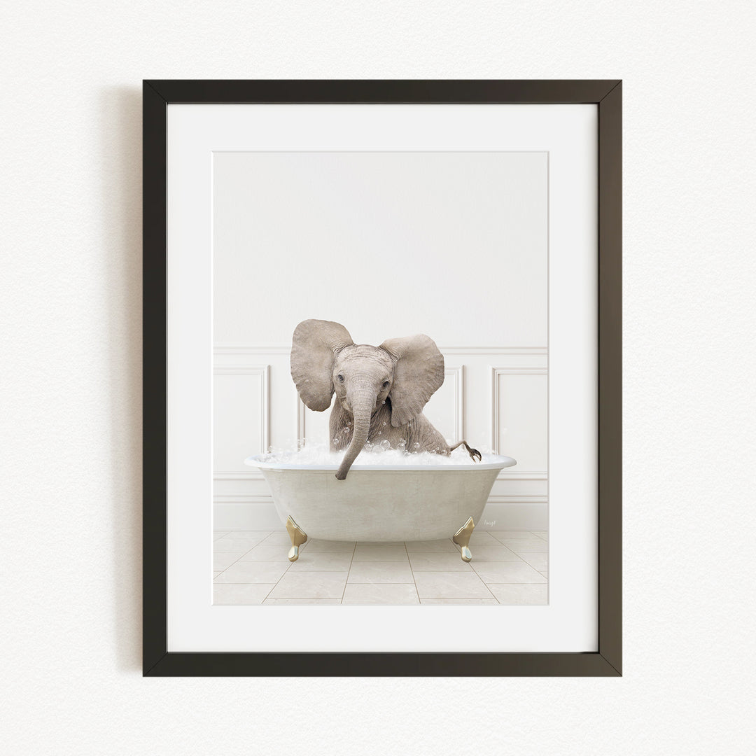 A baby elephant sitting in a bathtub filled with water, enjoying a bath.