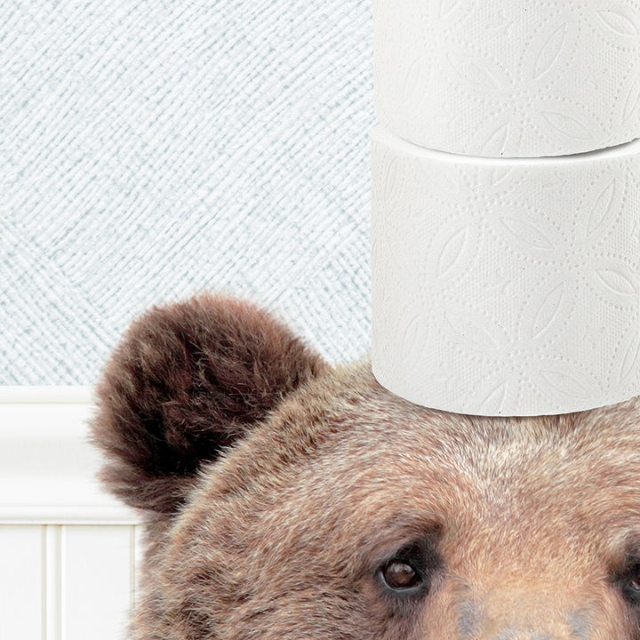 a close up of a bear with a toilet paper on its head