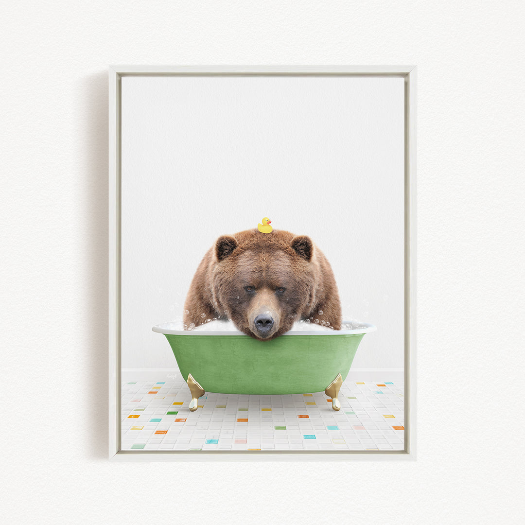 A brown bear is sitting in a green bathtub filled with water, with a rubber duck floating on its head.