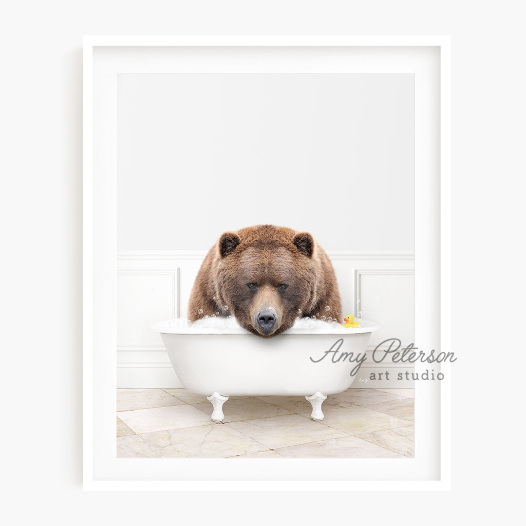 a brown bear sitting in a bath tub