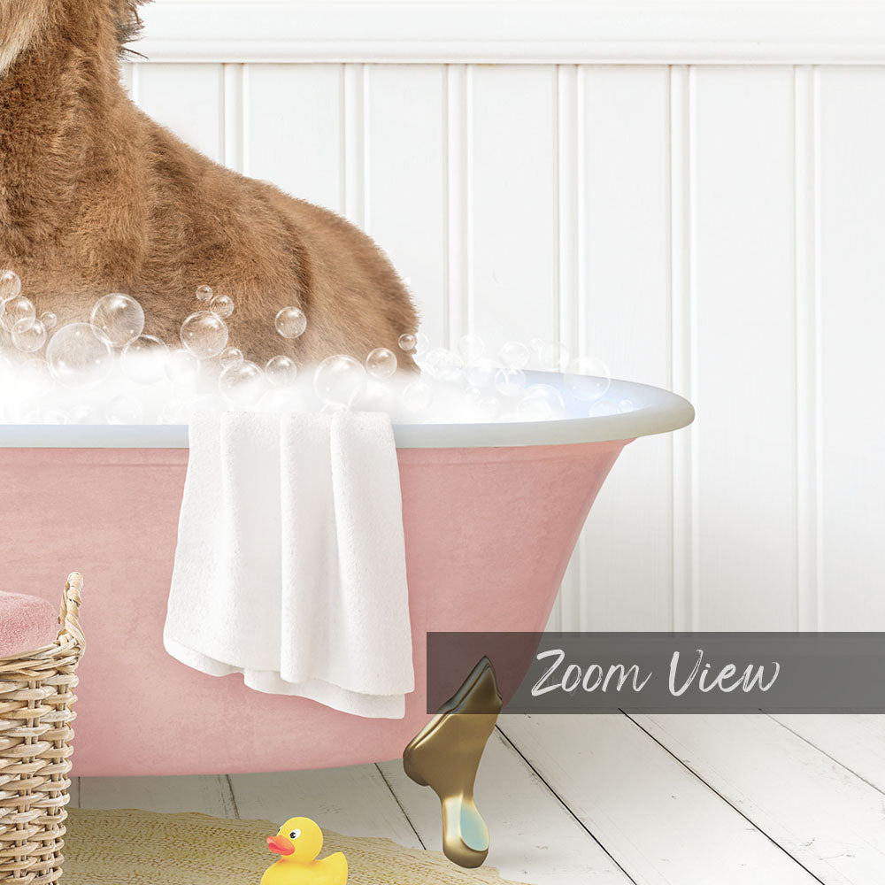 A dog is sitting in a pink bathtub filled with bubbles, surrounded by a yellow rubber duck and a white towel.