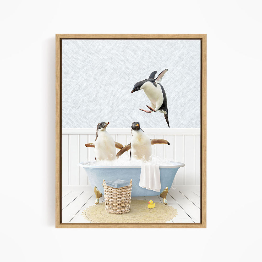 A framed image depicting two penguins sitting in a bathtub, with one penguin flying towards the other penguin.