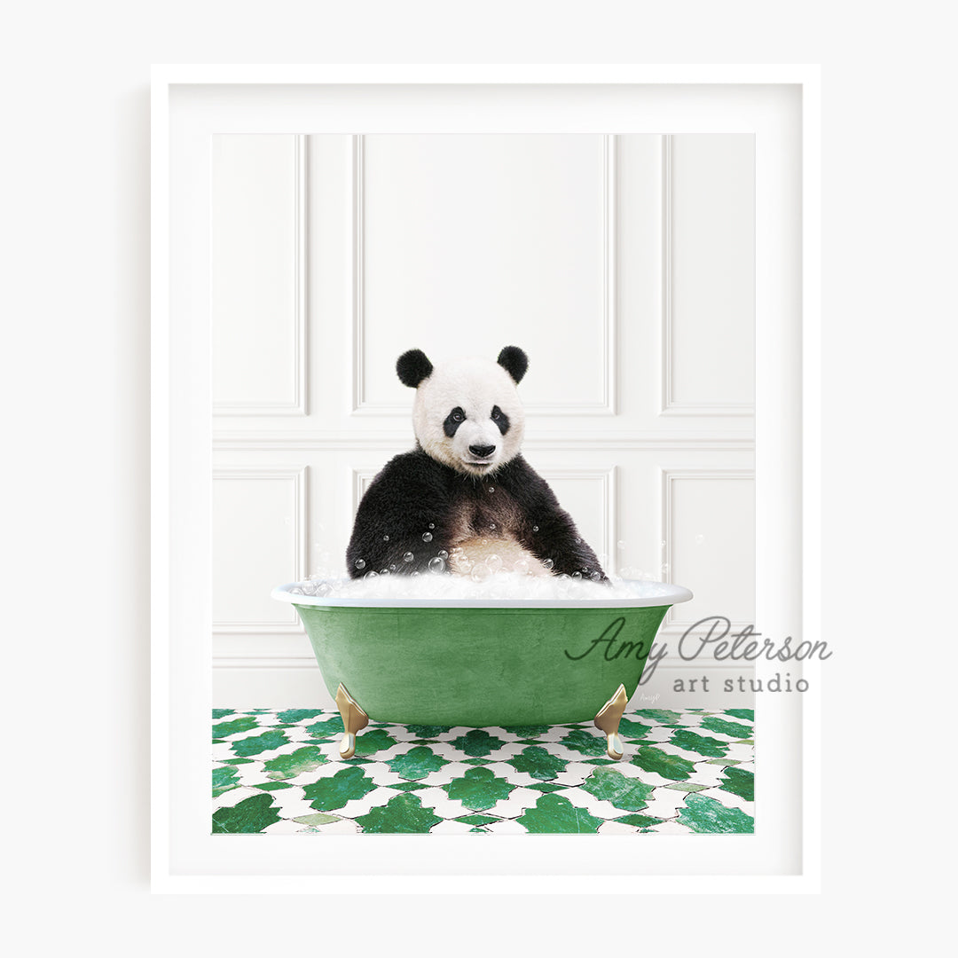 a panda bear sitting in a green bath tub