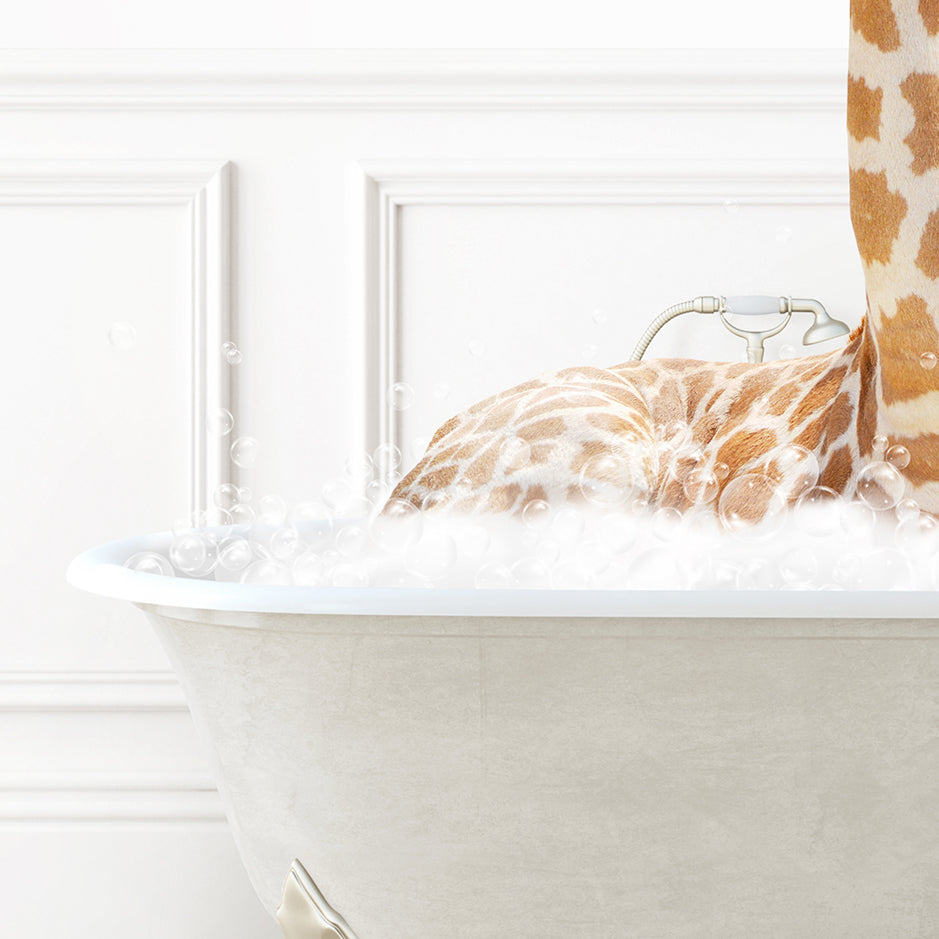 a giraffe laying down in a bath tub