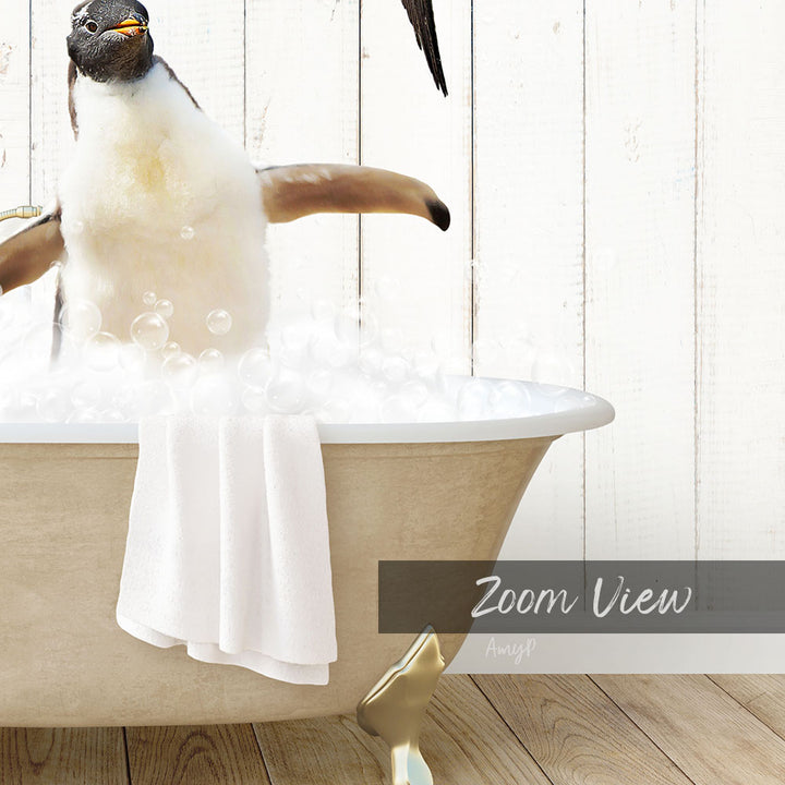A penguin sitting in a bathtub filled with bubbles, with a towel draped over its back.