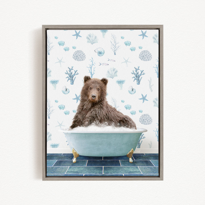 A brown bear sitting in a blue bathtub filled with bubbles, surrounded by a pattern of seashells, starfish, and other marine life.