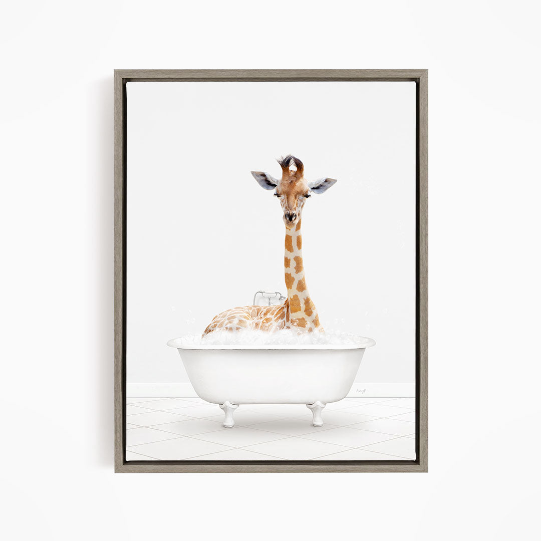 A giraffe sitting in a white bathtub filled with water, appearing to enjoy the bath.