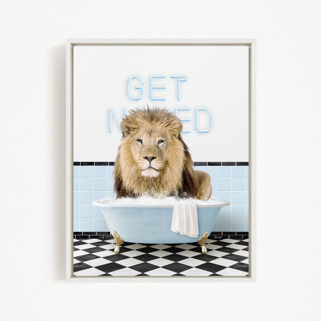 A lion sitting in a bathtub with the words "GET NEEDED" written on the wall behind it.