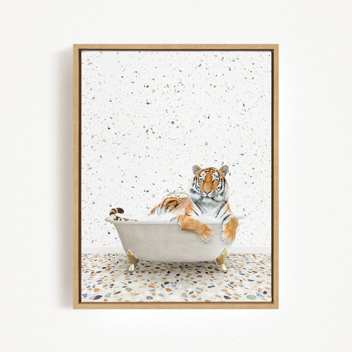 A tiger is sitting in a white bathtub, surrounded by a speckled background.