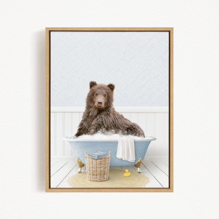 A brown bear sitting in a blue bathtub filled with water, surrounded by rubber ducks and a basket.