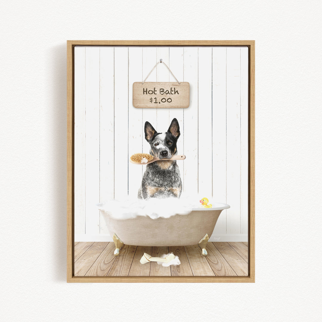 A framed image depicting a dog standing in a bathtub, holding a brush and surrounded by a sign that reads "Hot Bath $1.00".