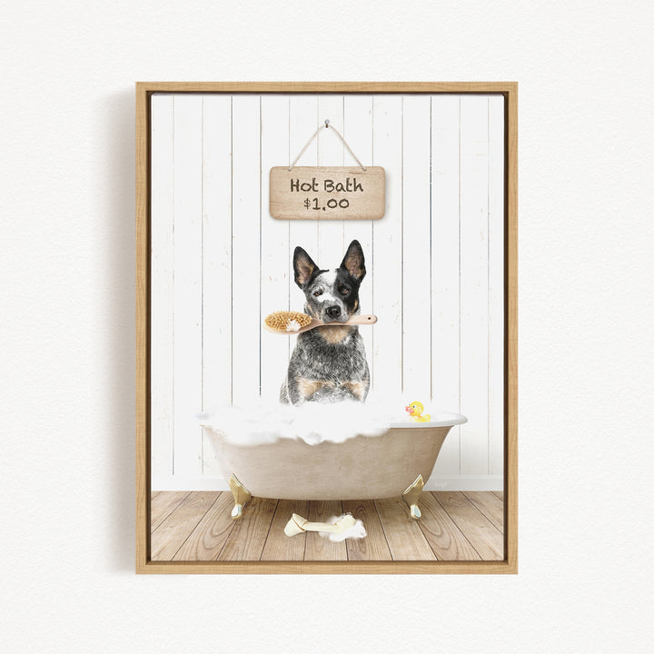 A framed image depicting a dog standing in a bathtub, holding a brush and surrounded by a sign that reads "Hot Bath $1.00".