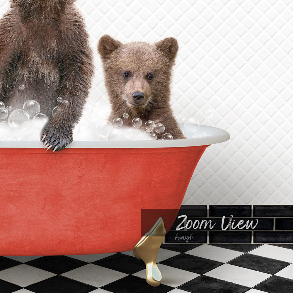 A red bathtub filled with bubbles, with a small brown bear sitting inside and looking at the camera.
